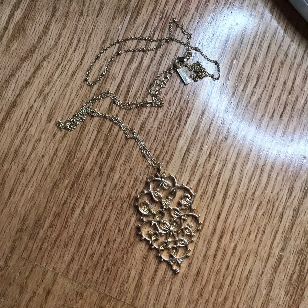 Long gold necklace